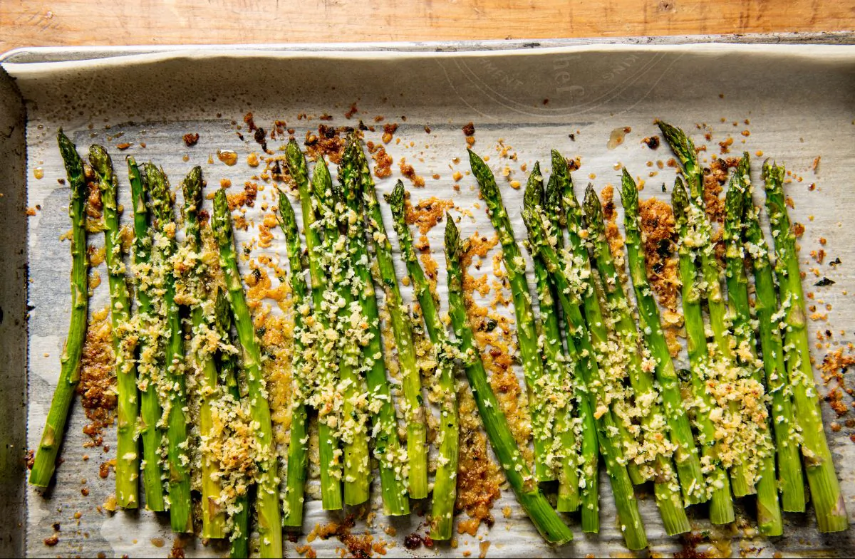 Panko and Parmesan cheese become a crispy, golden brown topping for roasted asparagus. (Cheyenne Cohen)