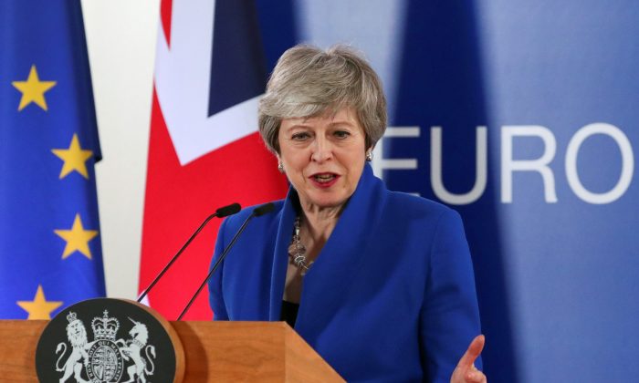 British Prime Minister Theresa May holds a news conference following a European Union leaders summit to discuss Brexit, in Brussels, Belgium April 11, 2019. (Reuters/Yves Herman)