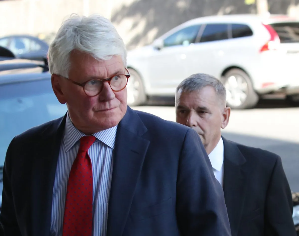 Attorney Greg Craig (L) arrives at US District Court in Washington on Oct. 17, 2016. (Mark Wilson/Getty Images)