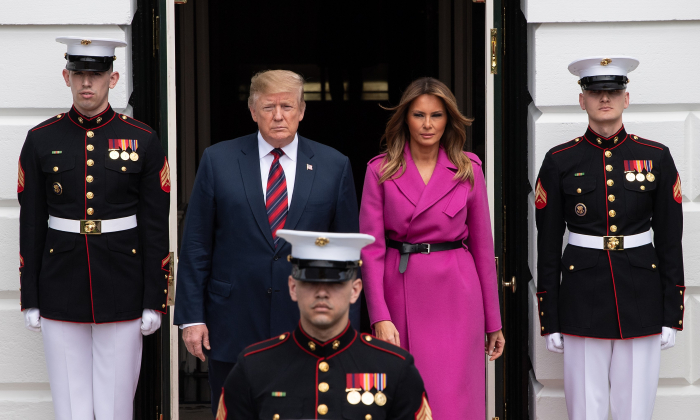 President Donald Trump and first lady Melania Trump walk out of the White House to welcome South Korean President Moon Jae-in and his wife Kim Jung-sook in Washington on April 11, 2019. (Nicholas Kamm/AFP/Getty Images)