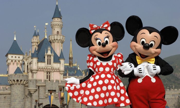 Mickey and Minnie Mouse are seen in front of the Sleeping Beauty Castle at the new Disneyland Park in Hong Kong. (Mark Ashman/Disney via Getty Images)