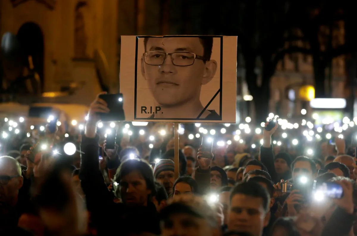 Demonstrators take part in a protest rally marking the first anniversary of the murder of investigative reporter Jan Kuciak and his fiancee Martina Kusnirova in Bratislava, Slovakia, Feb. 21, 2019.  (David W. Cerny/Reuters)