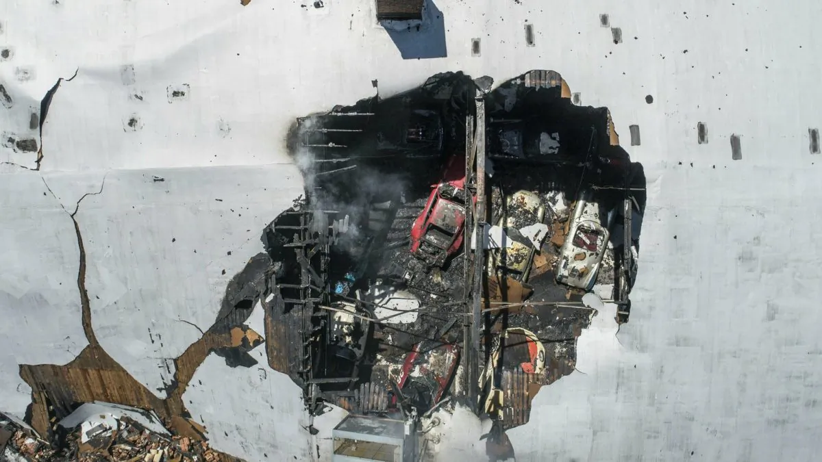 In this aerial image taken on April 10, 2019, firefighters battle a fire at the scene of an explosion in Durham, N.C. (Travis Long/The News & Observer via AP)