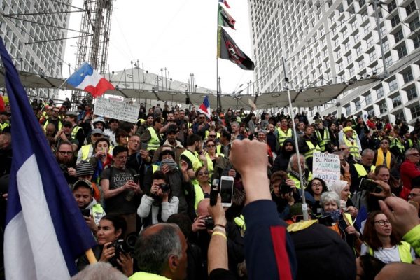 Protesters wearing yellow vests attend a demonstration