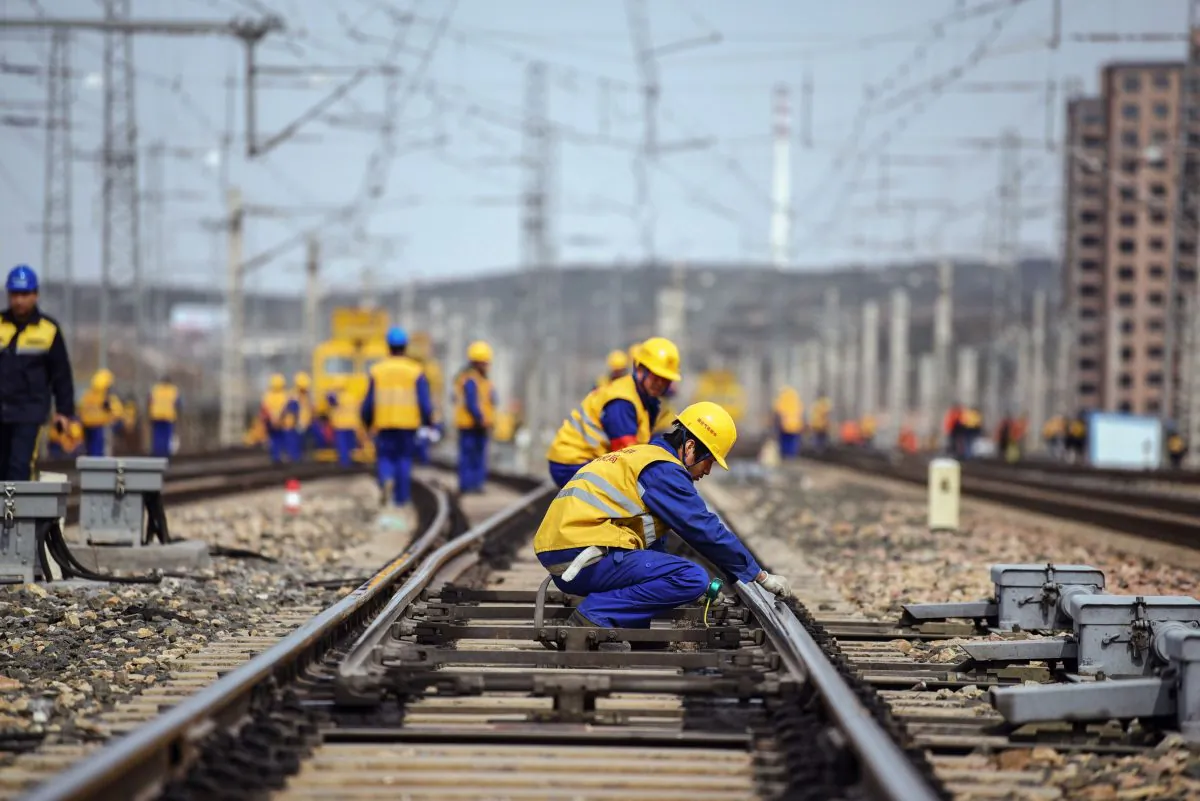 Workers are seen at a construction site of the Tangshan-Hohhot railway in Ulanqab, north China's Inner Mongolia region, March 19, 2019. China has drastically increased infrastructure spending in 2019. (STR/AFP/Getty Images)