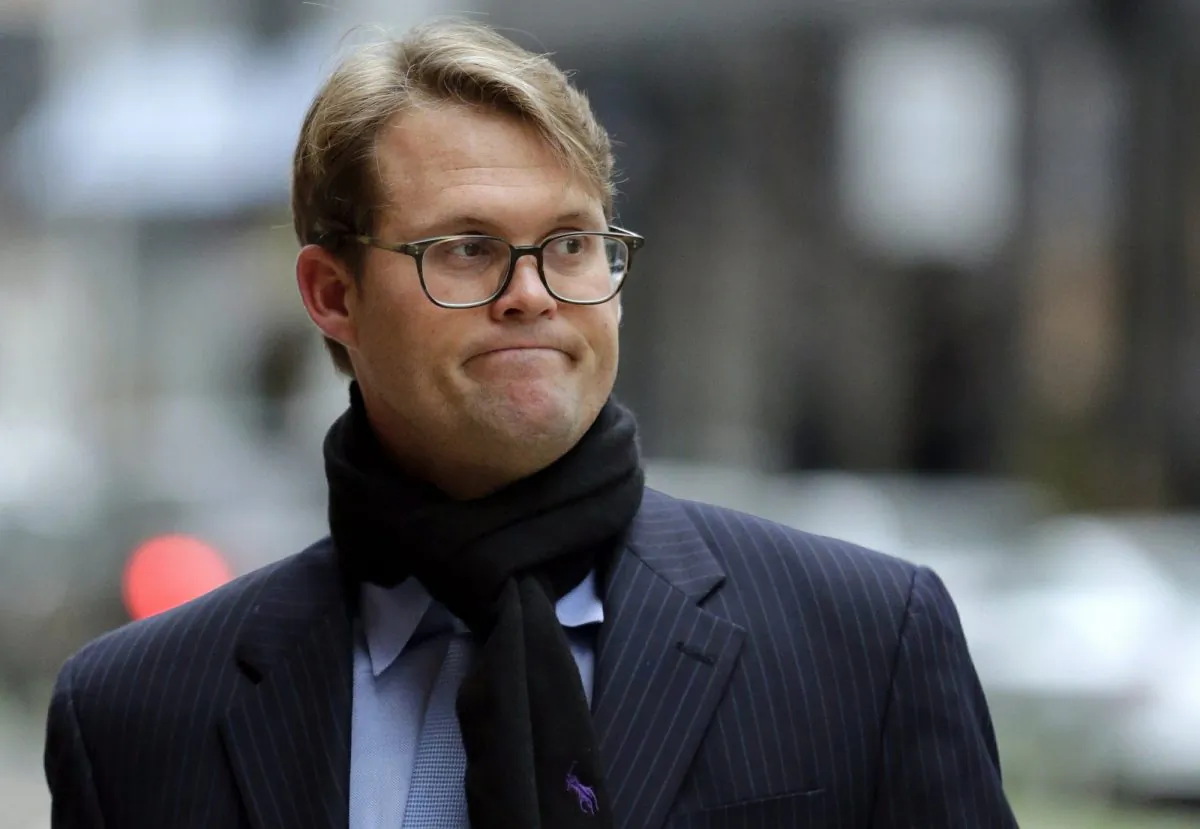 Mark Riddell arrives at federal court where he was scheduled to plead guilty to charges in a nationwide college admissions bribery scandal, in Boston on April 12, 2019. (Charles Krupa/Photo via AP)