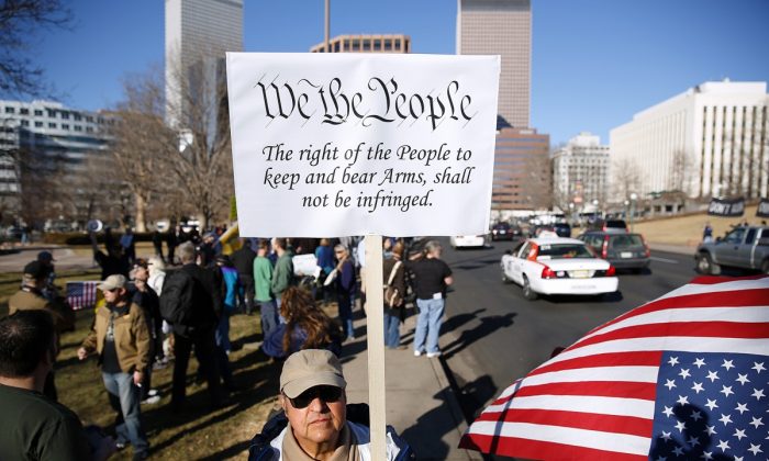 Second Amendment supporters gathered across the street from the Colorado State Capital to voice their support for gun ownership in Denver, Colo., on Jan. 9, 2013. (Marc Piscotty/Getty Images)