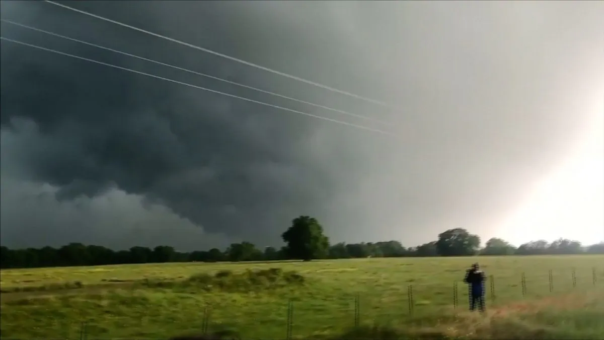 Dark clouds spiraled over a small town in Texas before turning into a tornado which injured at least seven people south east of Franklin, Texas, on April 13, 2019. (TWITTER @DOC_SANGER via Reuters)