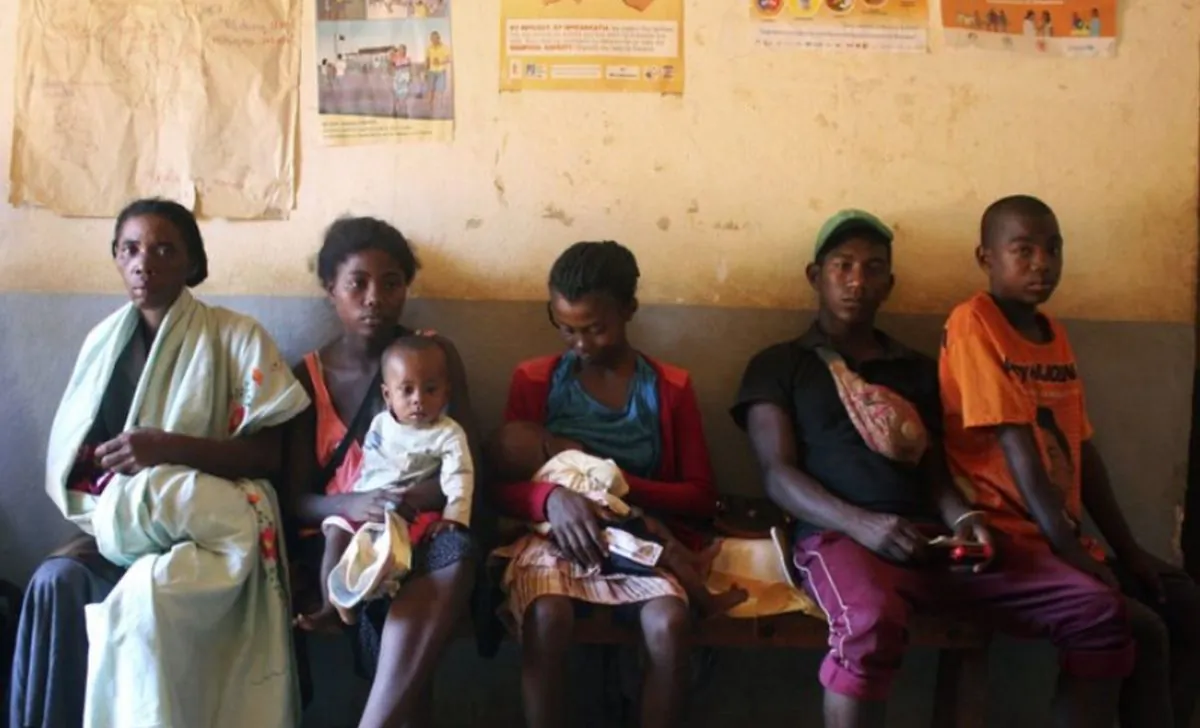 In this photo taken Thursday, March 21, 2019, mothers wait to have their babies vaccinated against measles, at a healthcare center in Larintsena, Madagascar (AP Photo/Laetitia Bezain)
