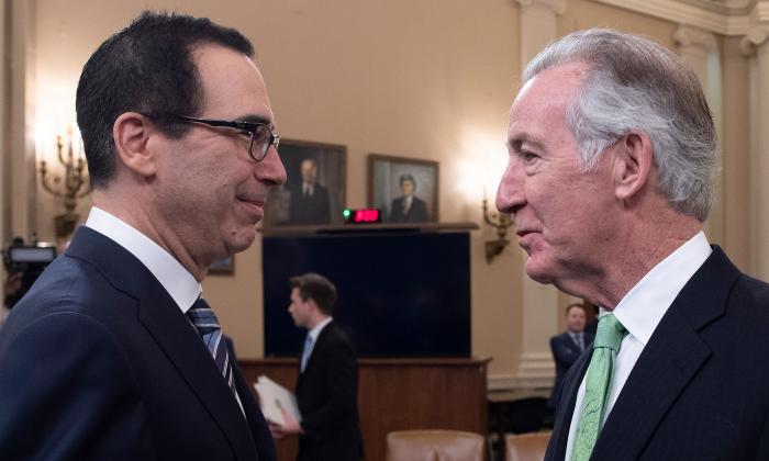 Treasury Secretary Steven Mnuchin (L) speaks with Chairman of the House Ways and Means Committee, Richard Neal, on March 14, 2019, on Capitol Hill in Washington. (Jim Watson/AFP/Getty Images)