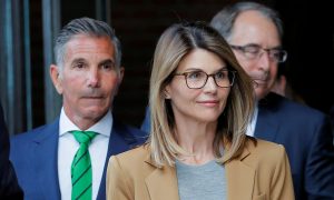 Actress Lori Loughlin Reports to Prison in College Scam