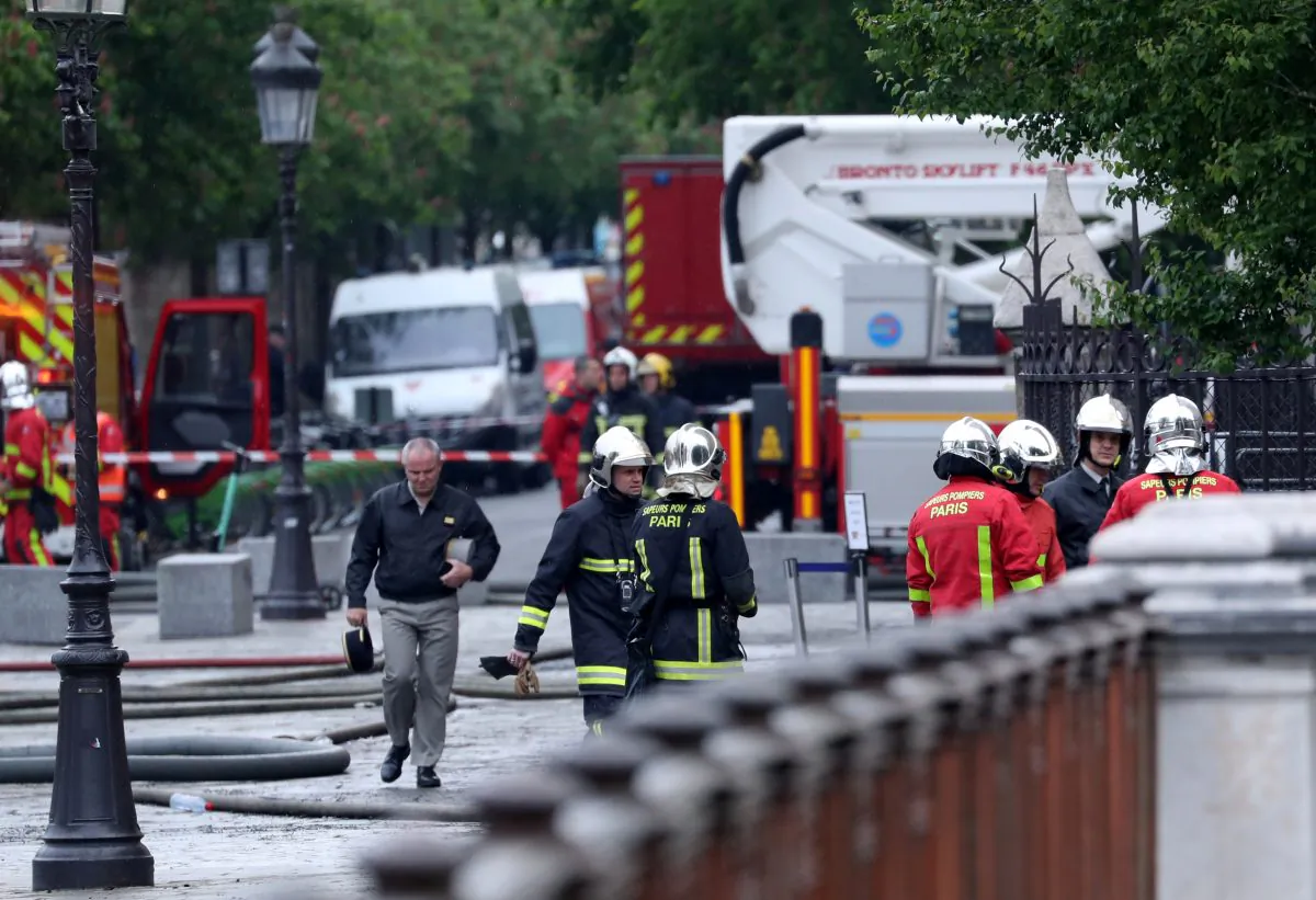 Firefighters work at Notre-Dame Cathedral in Paris, France, on April 16, 2019. (Yves Herman/Reuters)