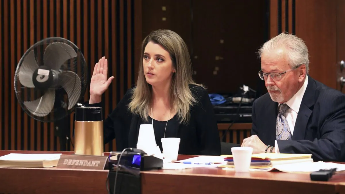 Kate McClure, 29, charged with theft by deception in the $400K GoFundMe scam, with her lawyer Jim Gerrow Jr., pleads guilty before State Superior Court Judge Christopher Garrenger in Burlington County Courthouse, Mt. Holly, N.J., on April 15, 2019. (David Swanson/The Philadelphia Inquirer via AP)
