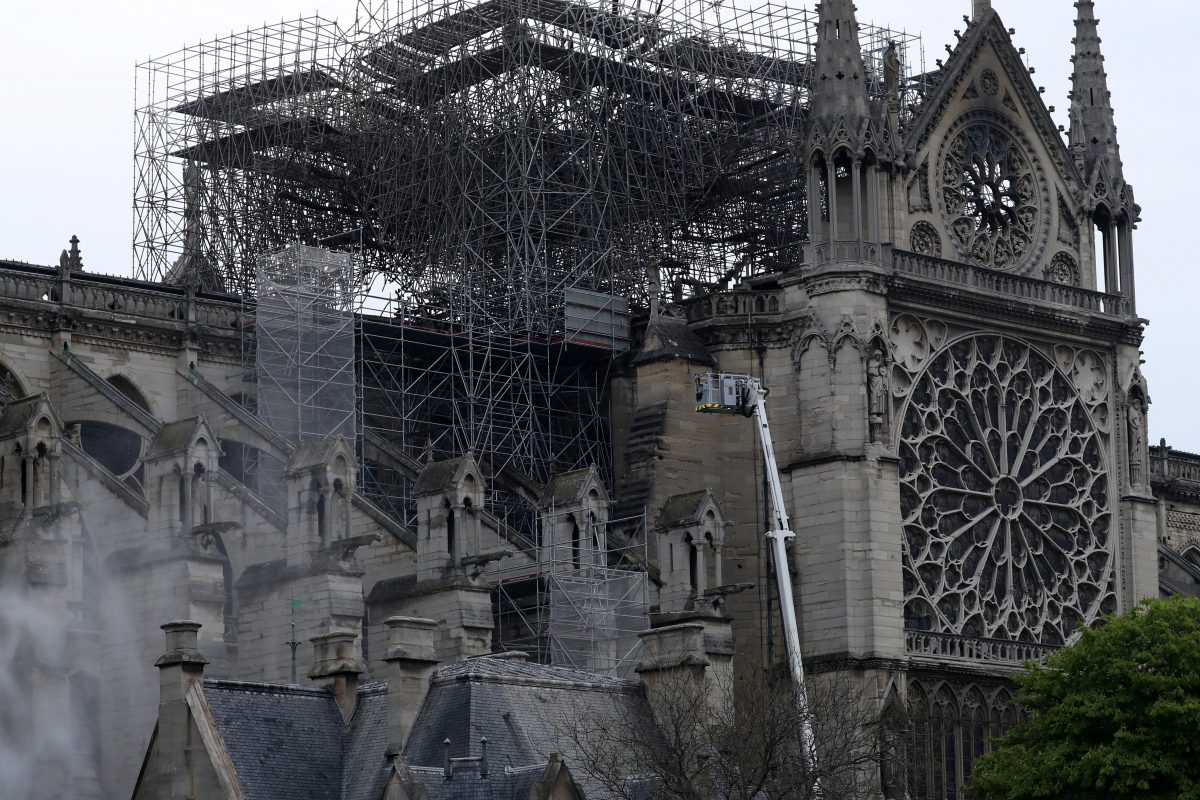Firefighters work at Notre-Dame Cathedral in Paris