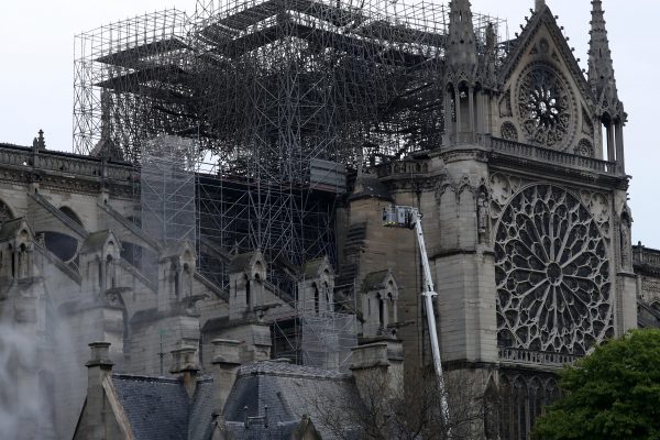 Firefighters work at Notre-Dame Cathedral in Paris