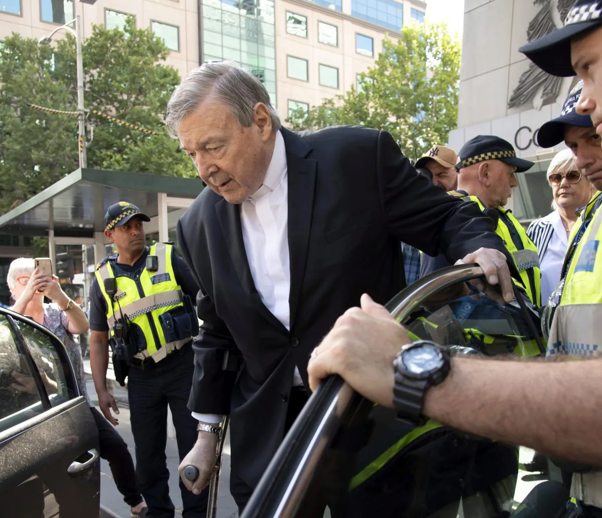 Cardinal George Pell leaves the County Court in Melbourne, Australia, on Dec. 11, 2018. (AP Photo/Andy Brownbill)