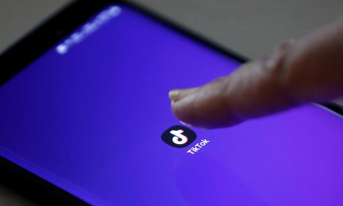 The logo of TikTok is seen on a mobile phone screen in this picture illustration taken on Feb. 21, 2019. (Danish Siddiqui/Reuters)