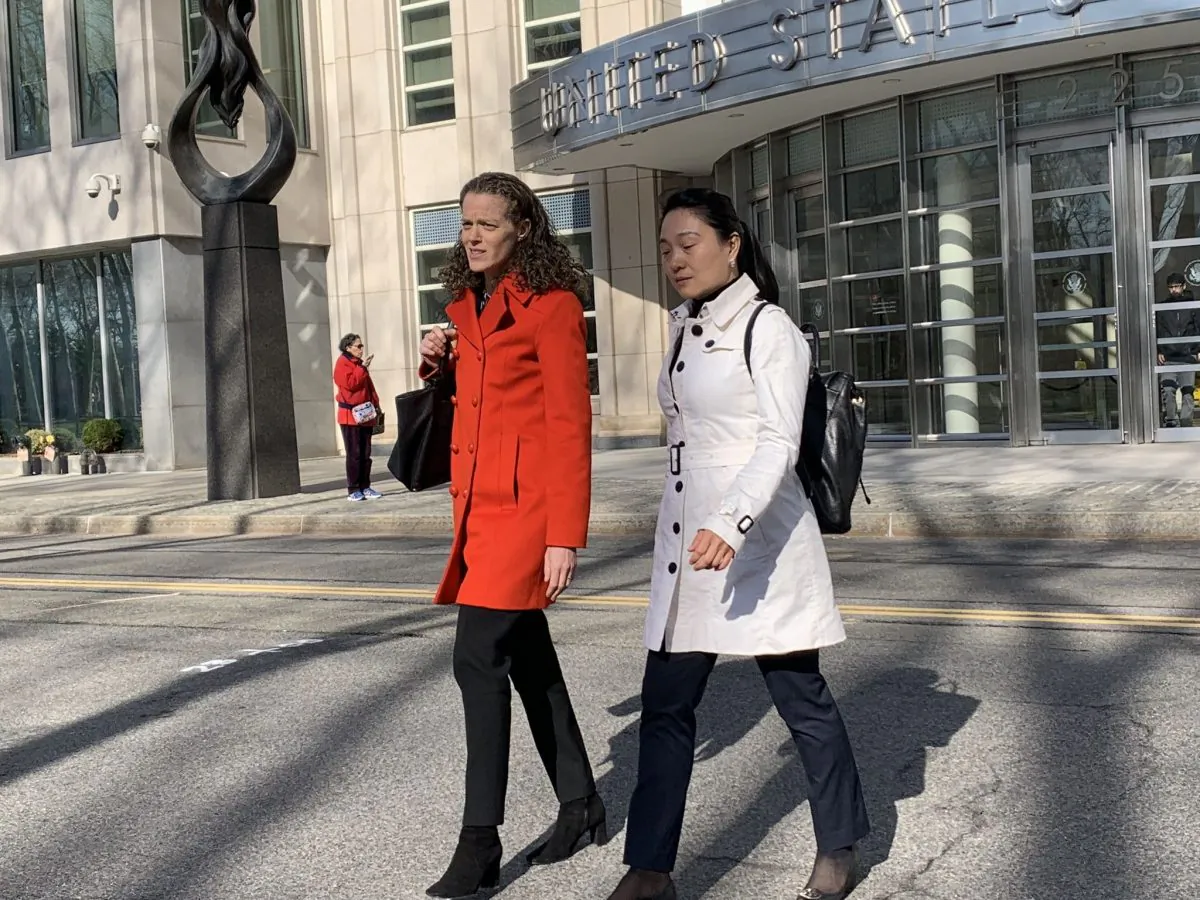 Ying Lin (R), a former Air China manager, walked out of the federal court in Brooklyn, New York City together with her attorney on April 17, 2019. (Cai Rong/Epoch Times)