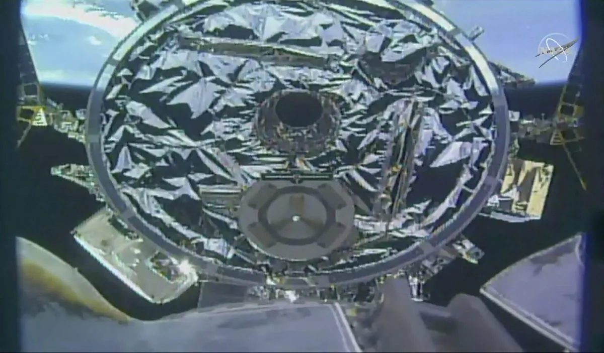 Cygnus capsule arrives at the International Space Station with food galore, following a 1 1/2-day journey from Virginia, on April 19, 2019. (NASA TV via AP)