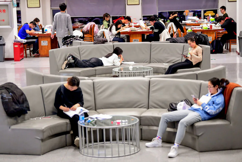This photo taken on December 18, 2018 shows university students preparing for the upcoming National Entrance Examination for Postgraduate (NEEP) at a library of Shenyang Agricultural University in Shenyang in China's northeastern Liaoning province. (STR/AFP/Getty Images)