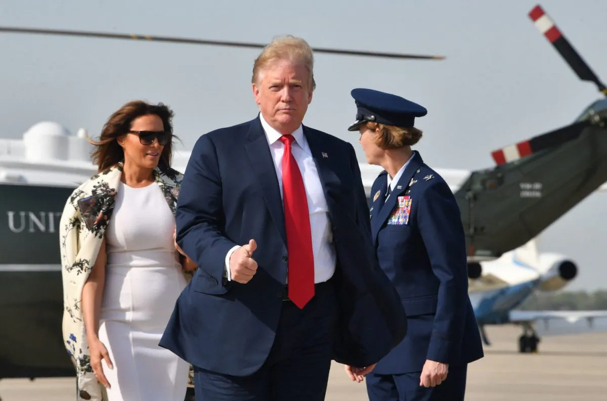 President Donald Trump and First Lady Melania Trump arrive at Andrews Air Force Base in Maryland prior to boarding Air Force One for departure to Florida, on April 18, 2019. (Nicholas Kamm/AFP/Getty Images)