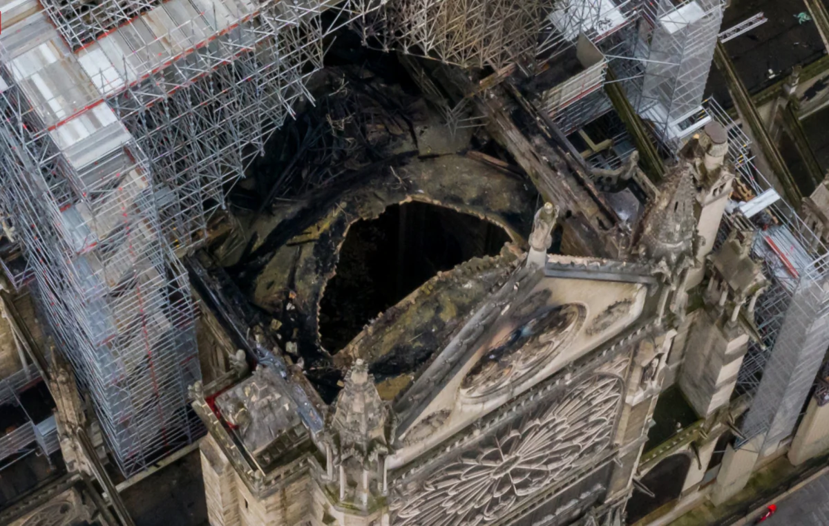 An aerial shot of the fire damage to Notre Dame cathedral in Paris on April 16, 2019. (Gigarama.ru)