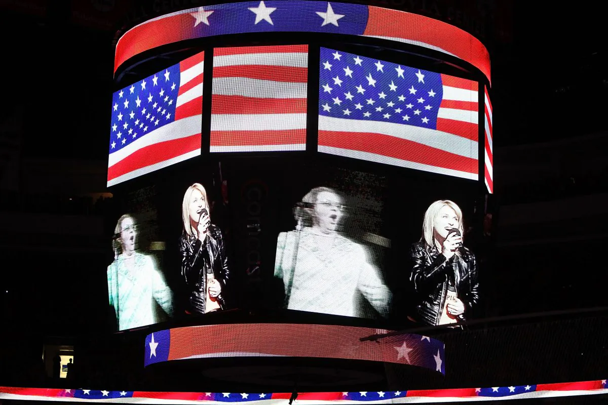 Singers Kate Smith, left, and Lauren Hart sing at the 2010 NHL Stanley Cup Final mat the Wachovia Center in Philadelphia, Pennsylvania on June 9, 2010. (Andre Ringuette/Getty Images)