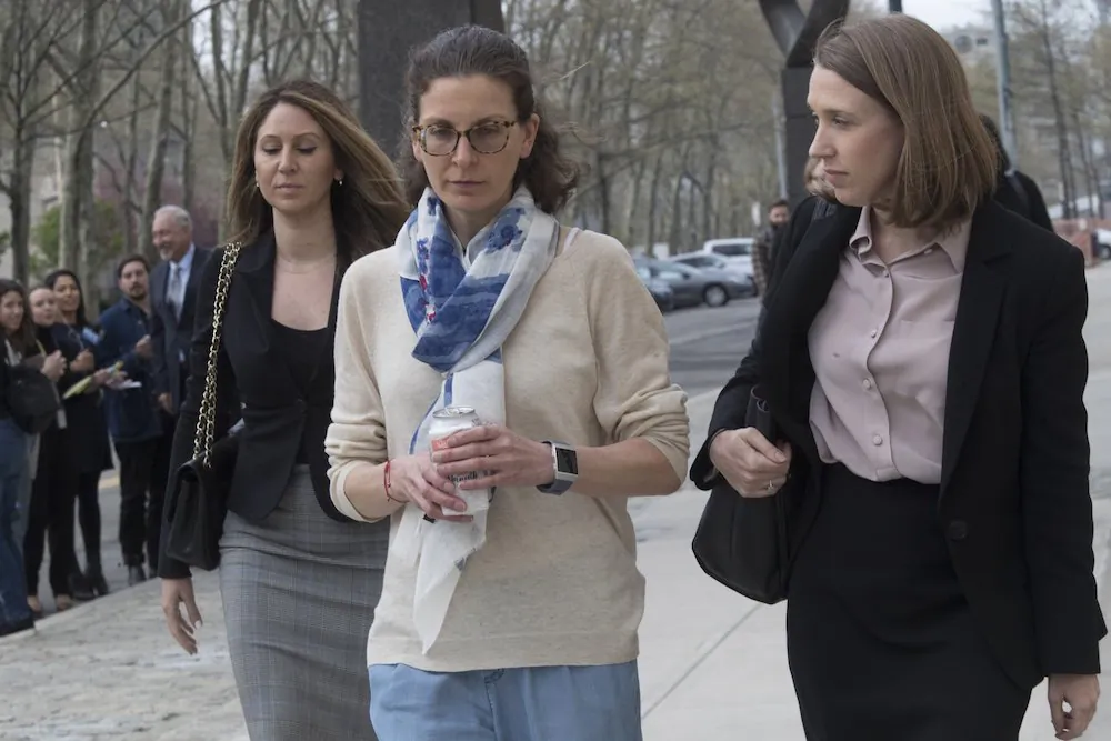 Clare Bronfman (C), leaves Federal court in the Brooklyn borough of New York, on April 19, 2019. (Mary Altaffer/AP Photo)