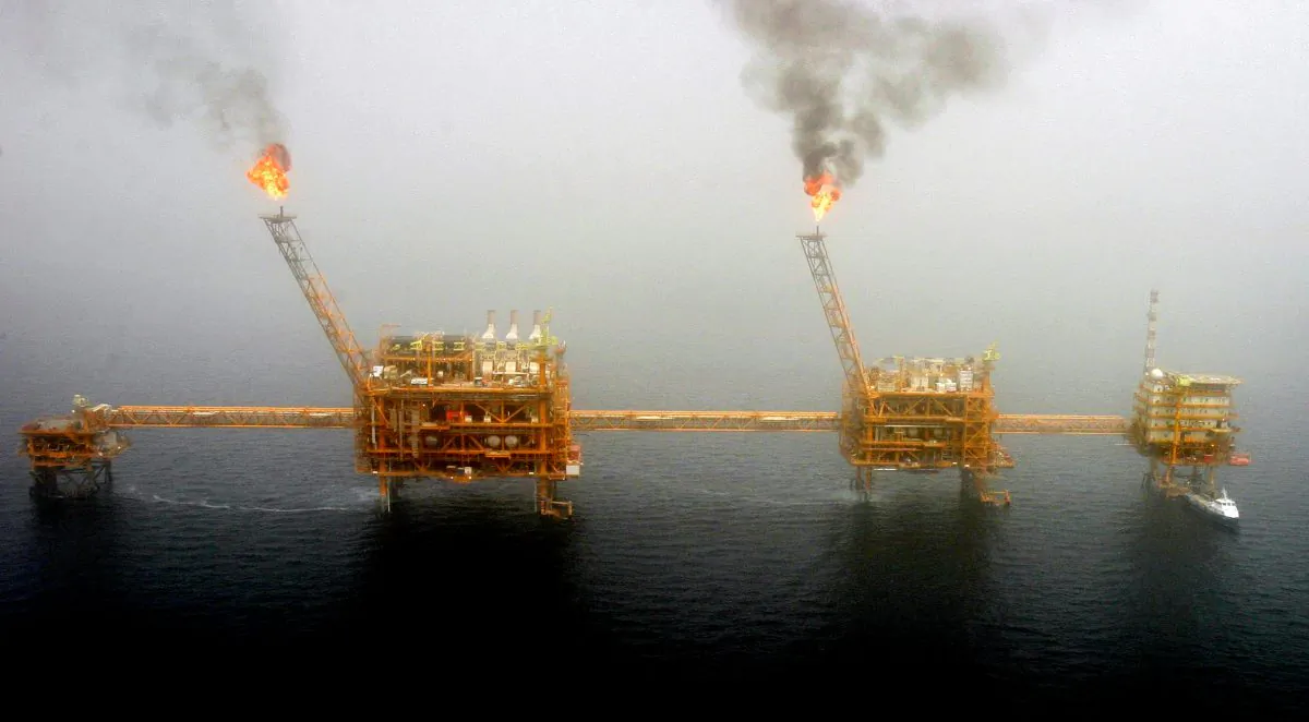 Gas flares from an oil production platform at the Soroush oil fields in the Persian Gulf, south of the capital Tehran, on July 25, 2005. (Raheb Homavandi/File Photo/Reuters)