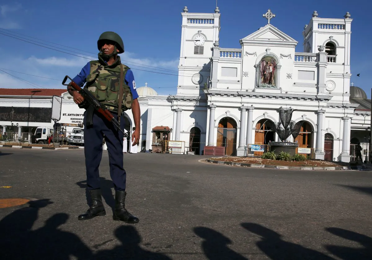 A security officer stands in front of St. Anthony's shrine in Colombo, after bomb blasts ripped through churches and luxury hotels in Sri Lanka, on April 22, 2019. (Athit Perawongmetha/Reuters)