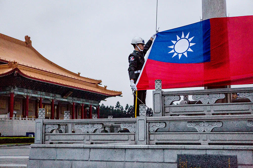 Honor guards prepare to raise the Taiwan flag in the Chiang Kai-shek Memorial Hall square ahead of the Taiwanese presidential election in Taipei, on Jan. 14, 2016. (Ulet Ifansasti/Getty Images)