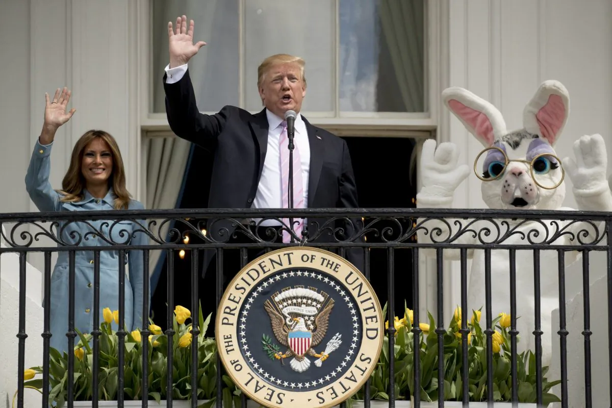 President Donald Trump, joined by the Easter Bunny and first lady Melania Trump speaks from the Truman Balcony of the White House in Washington during the annual White House Easter Egg Roll, on April 22, 2019. (Andrew Harnik/AP Photo)