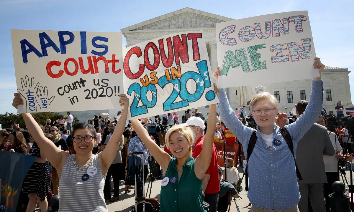 Protesters gather outside the U.S. Supreme Court as the court hears oral arguments in the Commerce v. New York case in Washington on April 23, 2019. Win McNamee/Getty Images