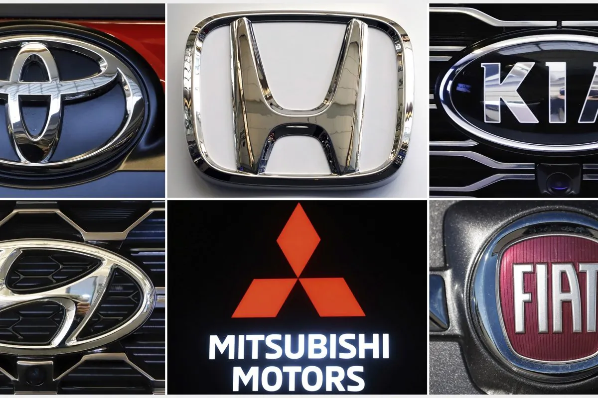 Logos of Honda and Mitsubishi. April 23, 2019.(AP Photos)
