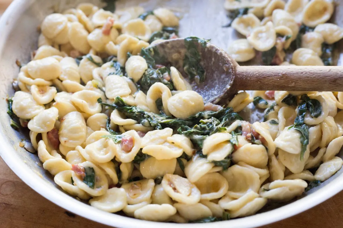 Creamy lemon pasta with pancetta and spring greens. (Caroline Chambers)