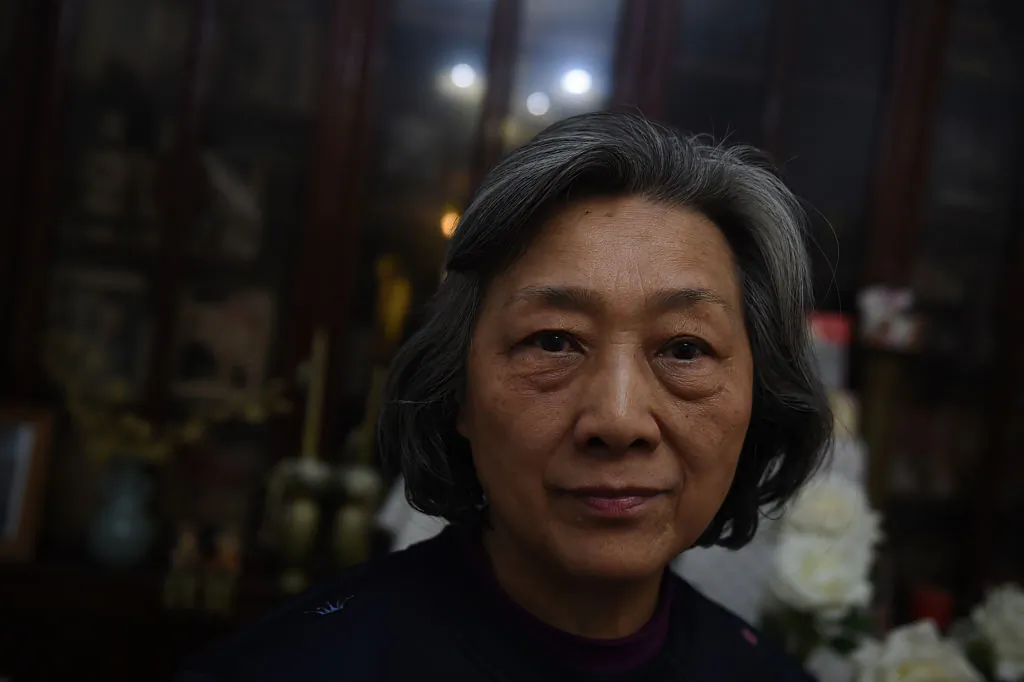 Veteran Chinese journalist Gao Yu poses for a photo at her home in Beijing on March 31, 2016.
She was jailed for "leaking state secrets" in a case that drew international condemnation and spoke out on March 31 for the first time since her release on medical parole. (GREG BAKER/AFP/Getty Images)