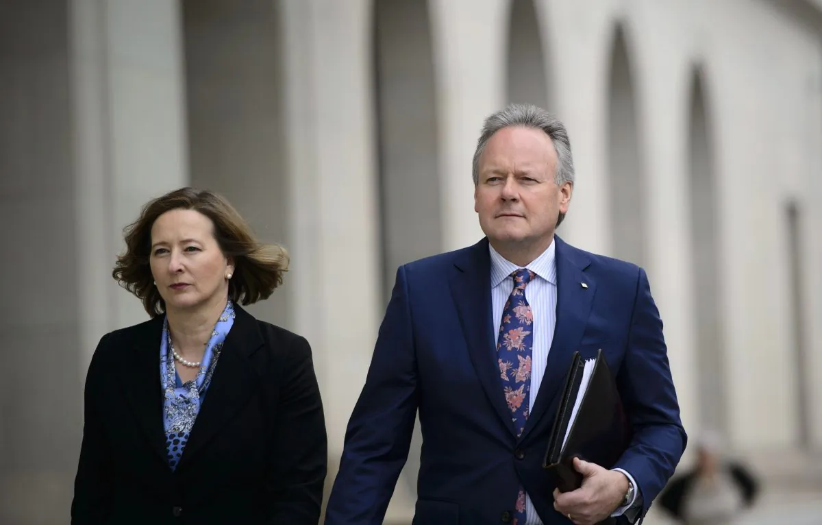 Bank of Canada governor Stephen Poloz and senior deputy governor Carolyn Wilkins make their way to a press conference at the National Press Theatre in Ottawa on April 24. The central bank held its key policy rate at 1.75 percent. (The Canadian Press/Sean Kilpatrick)