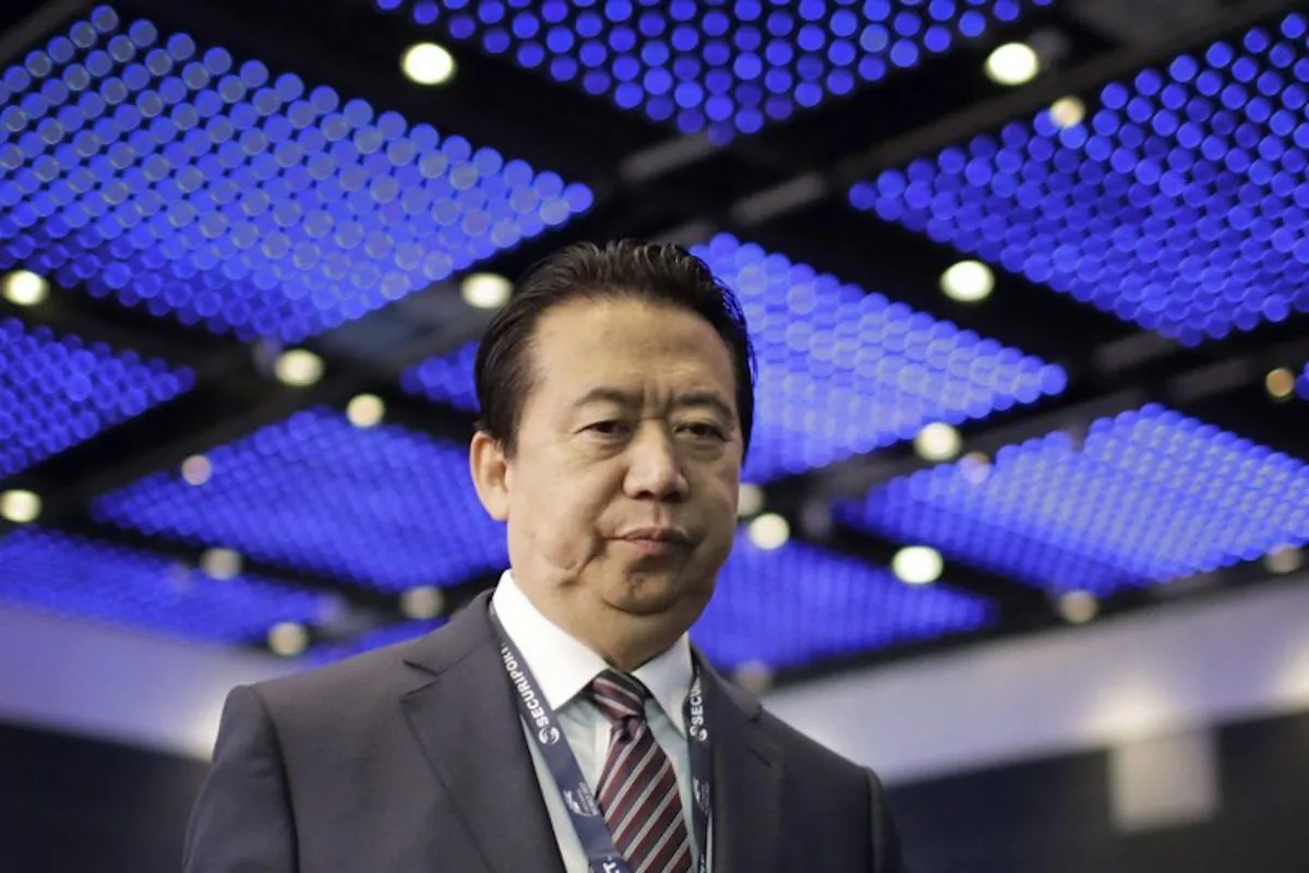 Interpol President, Meng Hongwei, walks toward the stage to deliver his opening address at the Interpol World congress in Singapore on July 4, 2017.  (Wong Maye/AP)