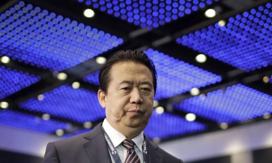 China Sentences Former Interpol Chief to 13 Years for Accepting Bribes
