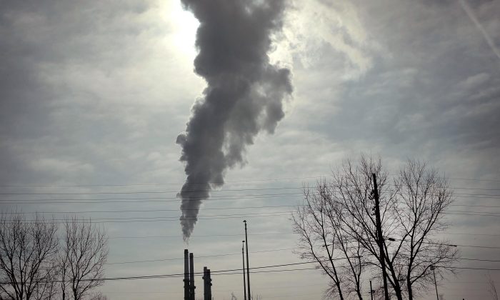 Smoke rises from a coal-fired power plant in Romeoville, Ill., on Feb. 1, 2019. (Scott Olson/Getty Images)