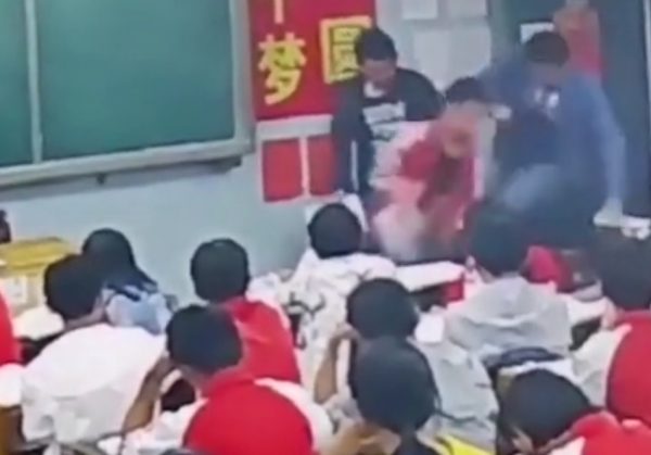Teacher attacks students