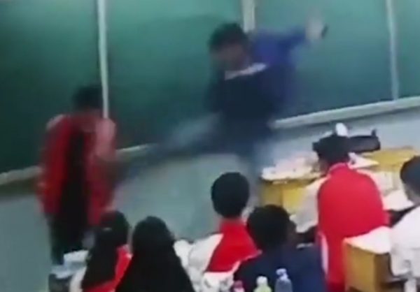 Teacher attacks students