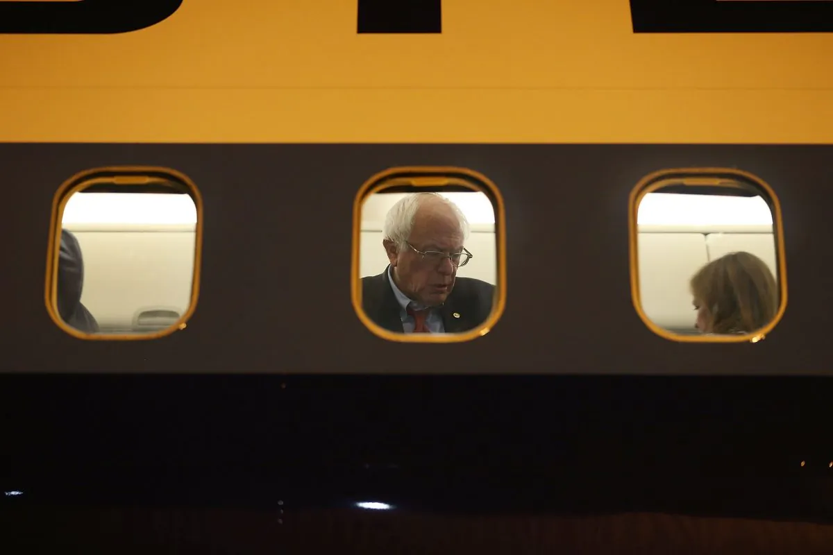 Democratic presidential candidate Sen. Bernie Sanders is seen through the  window of his plane on the tarmac at Signature Flight Support as he continues to campaign on February 18, 2016 in Las Vegas, Nevada.  Joe Raedle/Getty Images