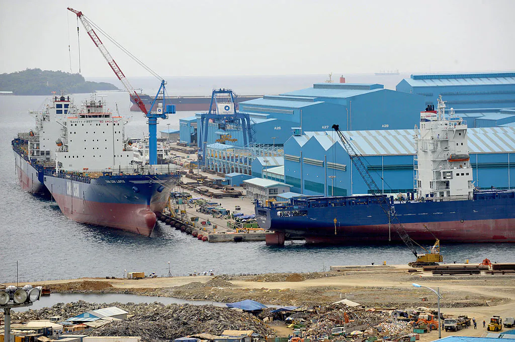 Workers labor at the shipyard of Hanjin Heavy Industries and Construction-Philippines, the local arm of South Korea's Hanjin group in Subic Bay, northwest of Manila, on March 13, 2009. (Jay Directo/AFP/Getty Images)