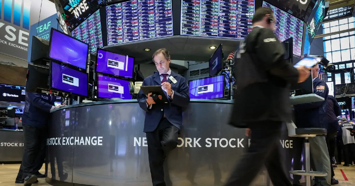 Traders work on the floor at the New York Stock Exchange (NYSE) in New York, U.S., April 23, 2019. (Brendan McDermid/Reuters)
