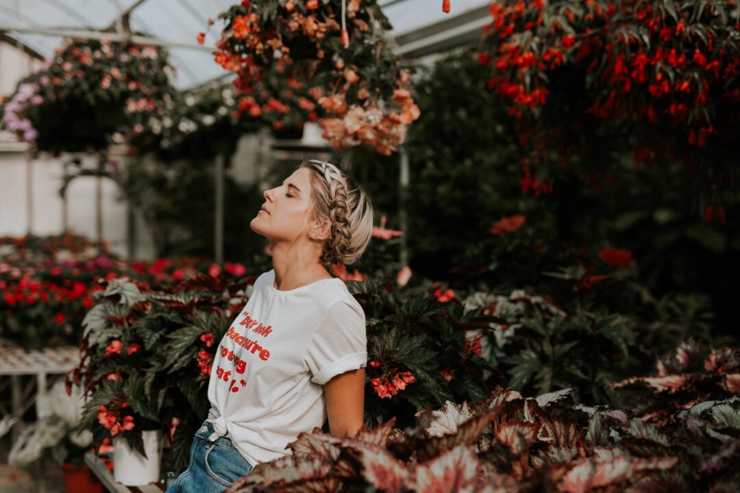 Stopping to smell the roses can give you a chance to soak up more of life, before it races by. (Brooke Cagle/Unsplash)