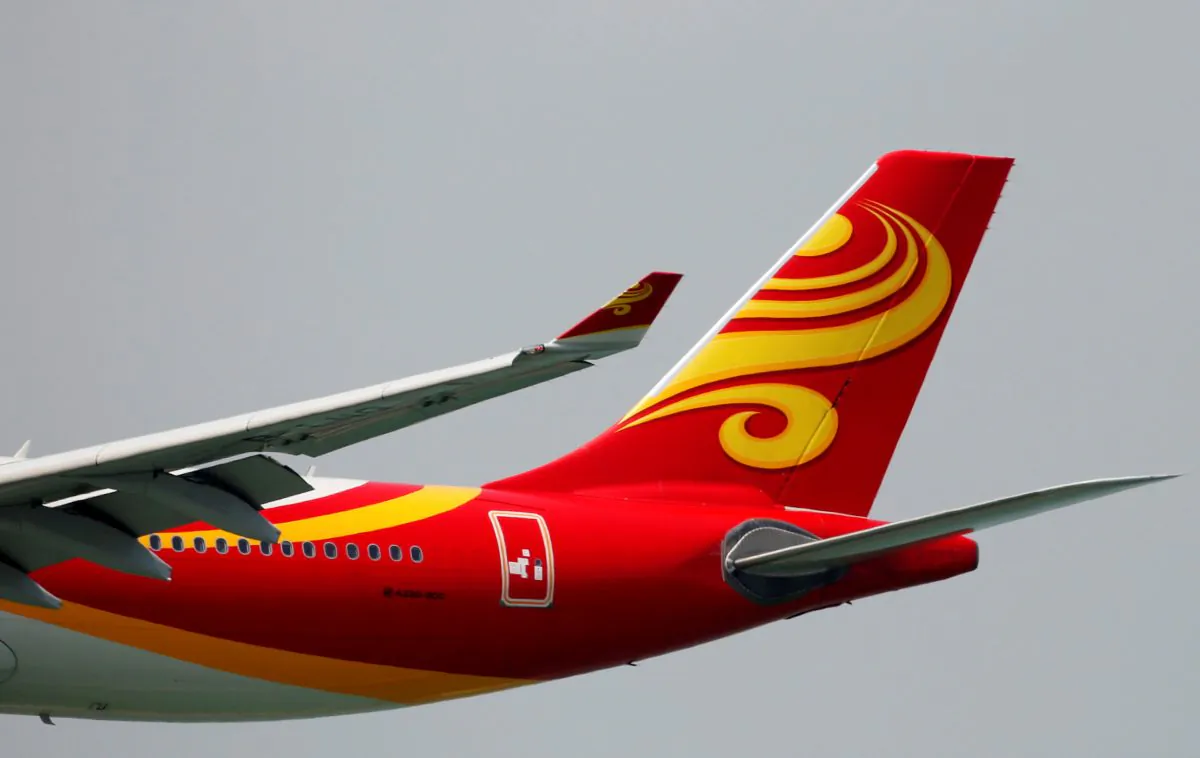 A Hong Kong Airlines Airbus A330-300 descends before landing at Hong Kong Airport in Hong Kong, China on April 4, 2018. (Bobby Yip/Reuters)