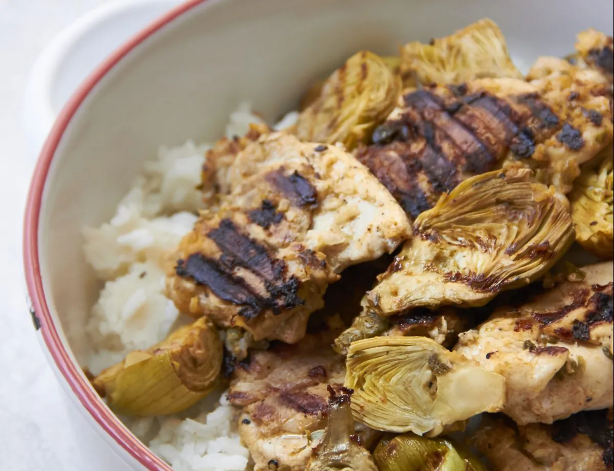 Grilled lemony chicken and baby artichokes. (Courtesy of Mia)