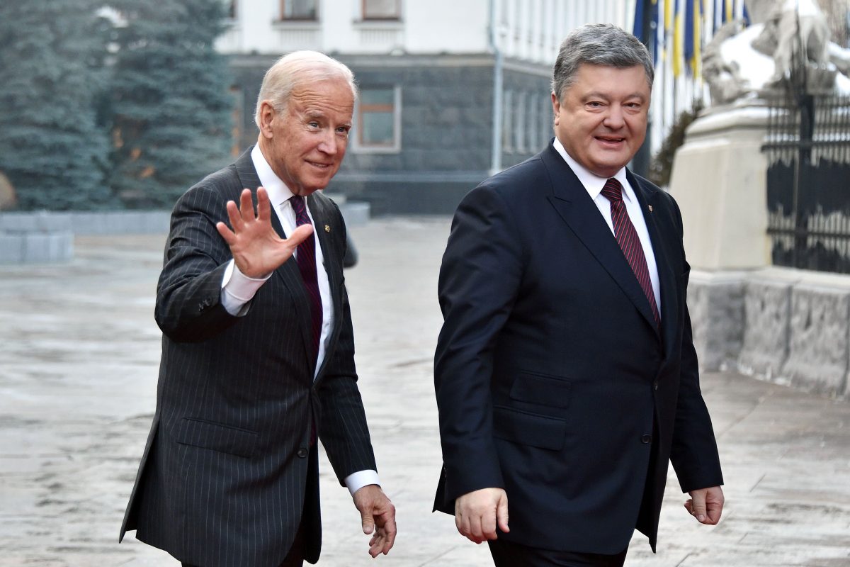 Joe biden is welcomed by Ukrainian president Petro Poroshenko