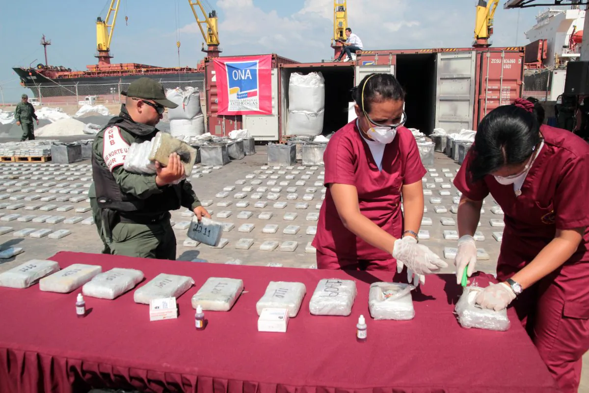 Criminology specialists test cocaine seized in Maracaibo, Venezuela, on April 25, 2013. JIMMY PIRELA/AFP/Getty Images